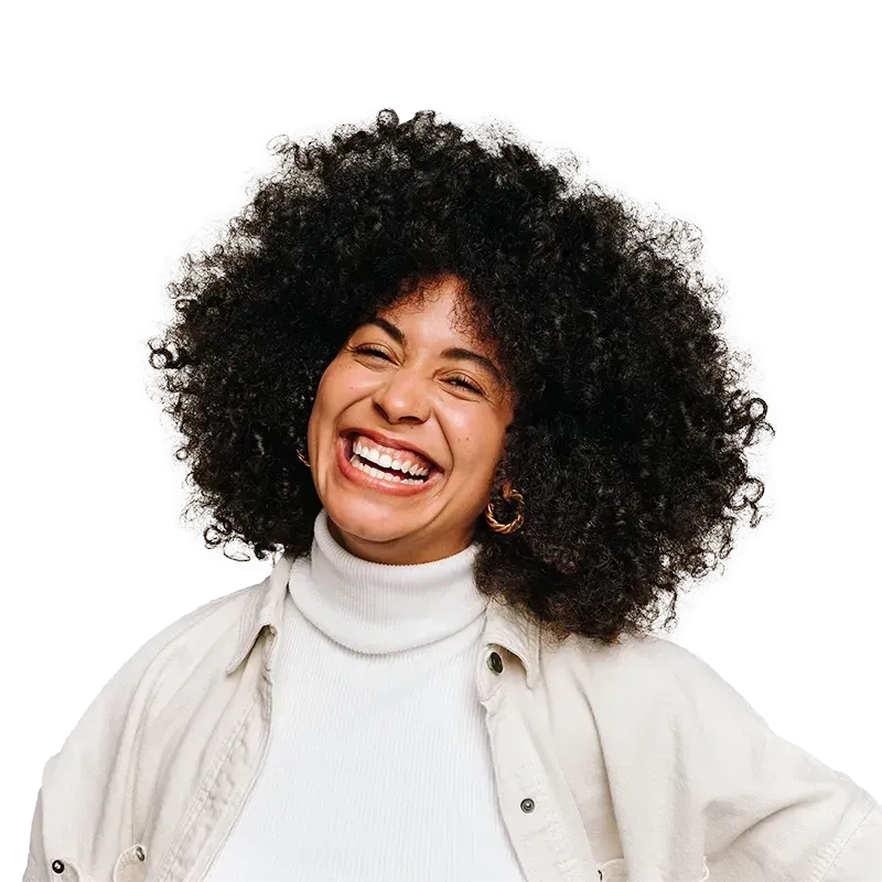 Woman with dark hair looking up and smiling